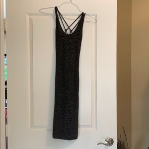 Sexy, sparkly, lightweight mini dress. Strapy back